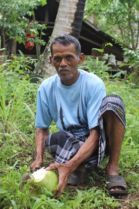 Muhammad Dahlan in his garden in Nusa village, Aceh, Indonesia