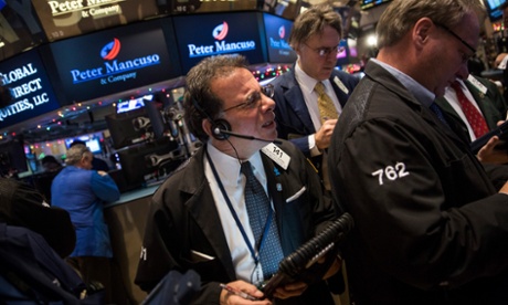 Traders on the floor of the New York Stock Exchange. Photo: Andrew Burton/Getty Images