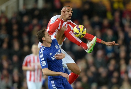 Steven N'Zonzi and Nemanja Matic battle for the ball.