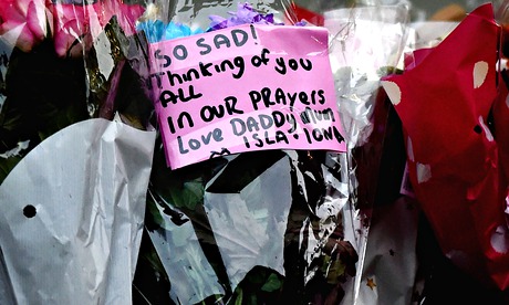 Floral tributes near to the scene of the bin lorry crash in Glasgow