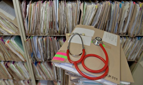 A doctor's stethoscope and patients' files 