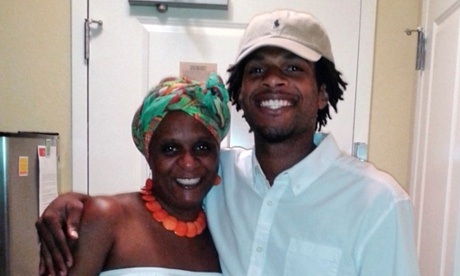 John Crawford with his mother, Tressa Sherrod.