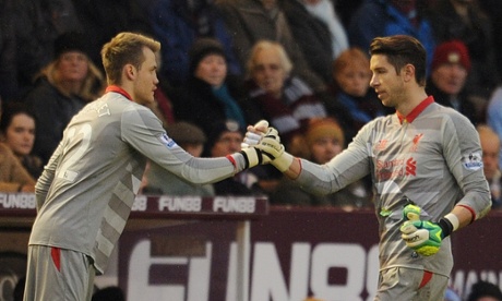 Liverpool goalkeeper Brad Jones comes off for the recently dropped Simon Mignolet.