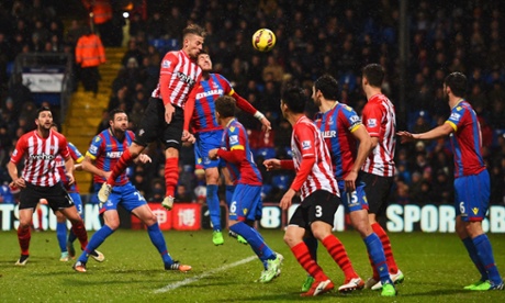 Alderweireld of Southampton rises highest to score their third goal.