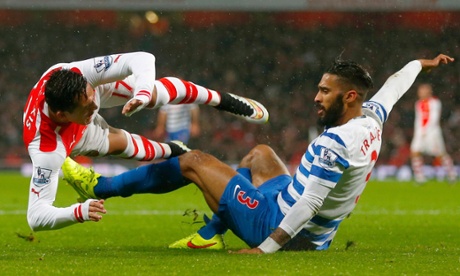 Alexis Sanchez is fouled by Queens Park Rangers' Armand Traore, resulting in a missed Arsenal penalty.