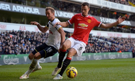 Jonny Evans steers the ball away from Harry Kane, still 0-0 at the Lane.