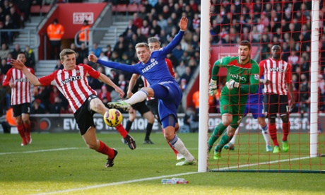 Matt Targett clears from the boot of Andre Schurrle.