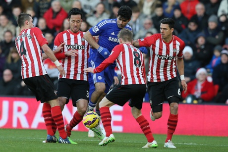 Diego Costa is crowded out by four Southampton players.
