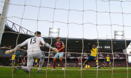 Danny Welbeck slots home the second past Adrian.