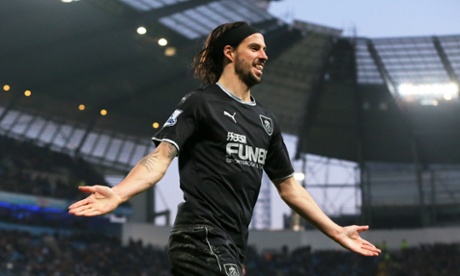 George Boyd celebrates after scoring for Burnley at the Etihad.