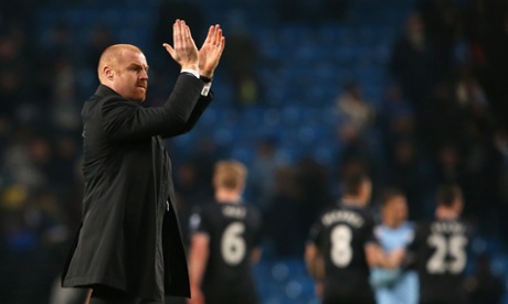 Burnley manager Sean Dyche applauds the fans after his side's valuable point against Manchester City.