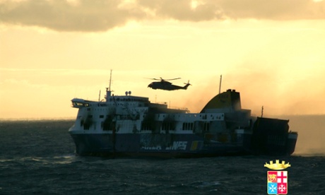 The car ferry Norman Atlantic is pictured on the way to Brindisi harbour after it caught fire in waters off Greece December 29, 2014