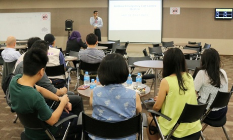 Next-of-kin being given an update by Mr Logan Velaitham, CEO of AirAsia Singapore, at Changi Airport's Relatives' Holding Area at Terminal 2. Photo courtesy of Changi Airport Group.