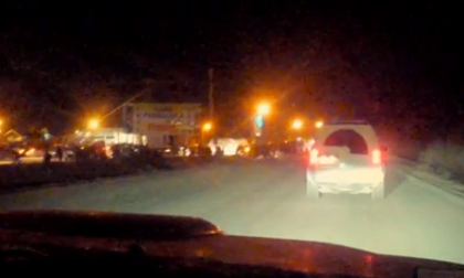 Top Gear's production crew were pelted with stones and eggs as they left Argentina with a police escort