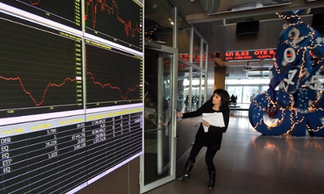 Greek shares fall and bond yields rise after election announcement. Photo: Orestis Panagiotou/EPA.