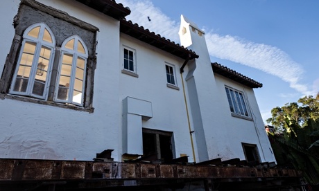 A Star Island residence is lifted in preparation for being moved.