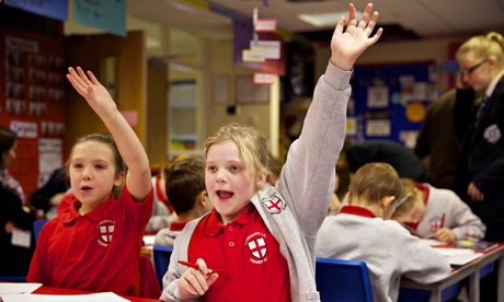 Year five pupils at St George's primary school in Chorley, Lancashire, in a financial management les