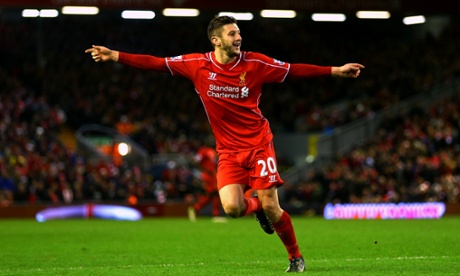 Adam Lallana celebrates after scoring Liverpool's second goal.