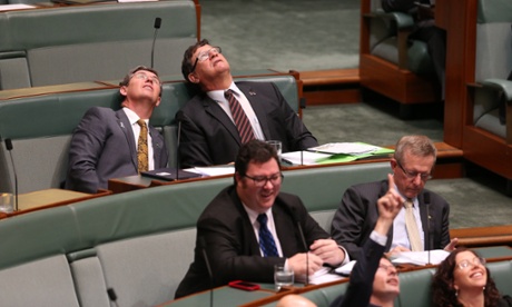 Members look up to a leak in the roof during question time in the House of Representatives in Parliament House Canberra this afternoon, Wednesday 3rd December 2014.