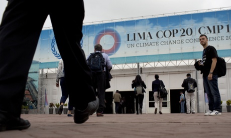 People arrive to the Climate Change Conference in Lima, Peru, Monday, Dec. 1, 2014.