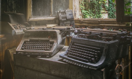 Abandoned typewriters covered in dust
