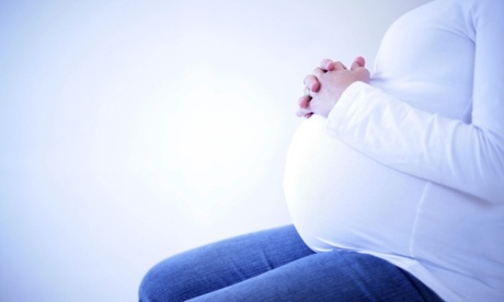 Mandatory Credit: Photo by Denis Closon / Rex Features ( 729759c ) Close-up on the belly of a pregnant woman Pregnant woman PREGNANT WOMAN CLOSE-UP ON THE BELLY OF A PREGNANCY EXPECTANT EXPECTING ANTENATAL PRENATAL STOMACH BUMP STOCK NOT-PERSONALITY 2548055