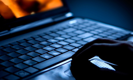 Person watching porn on a laptop.