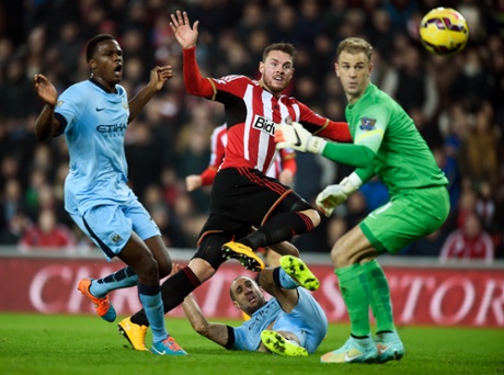 Connor Wickham of Sunderland scores the opening goal against City.