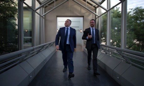 The Treasurer Joe Hockey walks back to his ministerial office after an interview in the press gallery of Parliament House in Canberra this morning, Thursday 4th December 2014