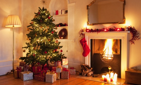 Christmas tree with gifts roaring fire