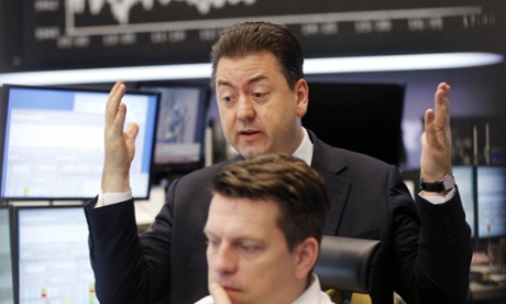 The last trading day of the year at the Frankfurt stock exchange. Photo: AP Photo/Michael Probst