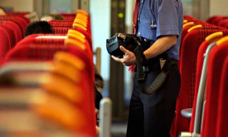 Inspector checks train tickets