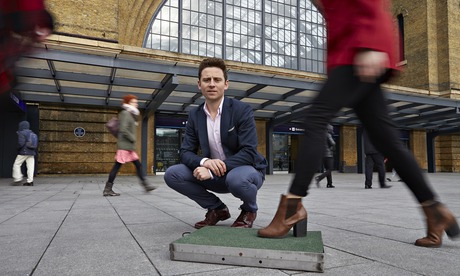 Designer Laurence Kemball-Cook with his Pavegen tile that is designed to convert the kinetic energy 