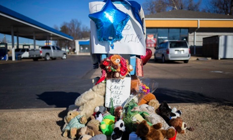 A memorial to Antonio Martin, who was fatally shot by police, is seen in Berkeley, Missouri on Christmas Day.
