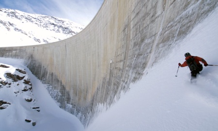Skiing off piste down the side of the Moiry Dam.