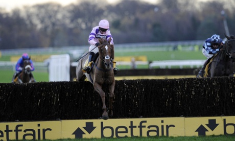 Silviniaco Conti (centre), pulls away from Menorah to win the Betfair Chase at Haydock Racecourse, Merseyside. Photo: John Giles/PA Wire.