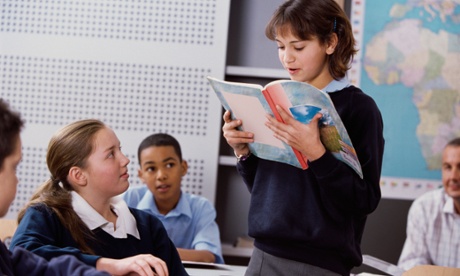 Group of children reading in school