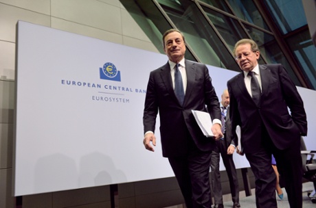 Mario Draghi (L), President of the European Central Bank and vicepresident Vitor Constancio (R) leave  the first press conference following the monthly ECB board meeting in the new ECB headquaters on December 4, 2014 in Frankfurt am Main, Germany.