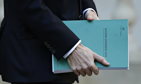George Osborne carrying the autumn statement document