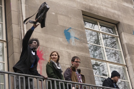 28 Feb 2014, London, England, UK. A bag containing documents is thrown from the office of the University of London's Vice-Chancellor. One way of extracting information from universities.