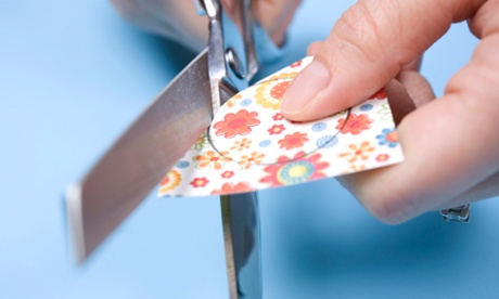 Scissors cutting paper