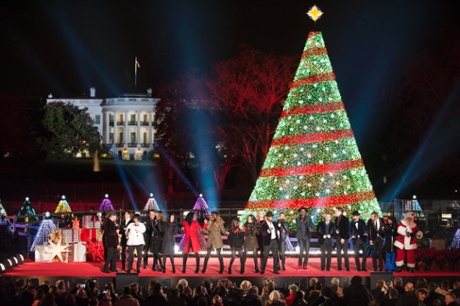 Performers sing during the close of the 92nd National Christmas Tree Lighting Ceremony on the Ellipse, south of the White House in Washington, DC, USA, 04 December 2014.