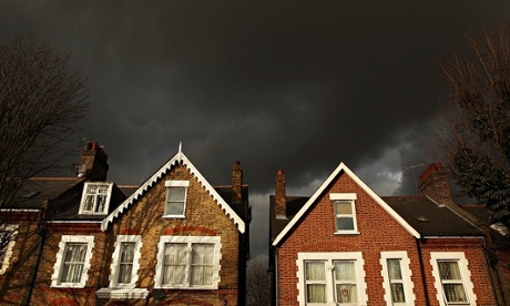Dark sky above suburban houses