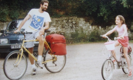 Emilly Chappell on a camping trip with her father and pink step-through bicycle.