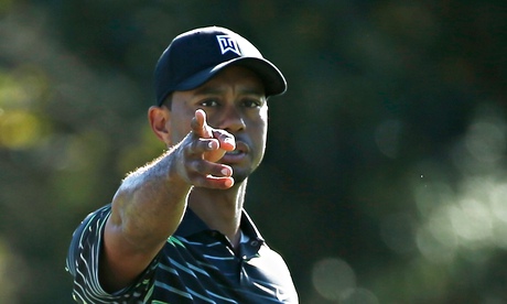Tiger Woods waits to play a shot on the 12th during the Hero World Challenge at Isleworth
