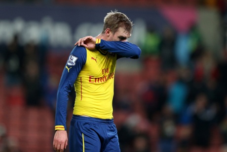 Per Mertesacker, dejected after another loss.