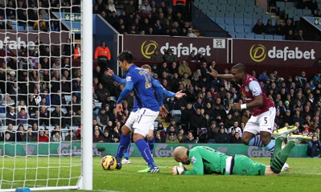 Leonardo Ulloa of Leicester City scores the opening goal.