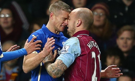 Paul Konchesky of Leicester City and Alan Hutton of Aston Villa go head to head, resulting in Konchesky being red carded.