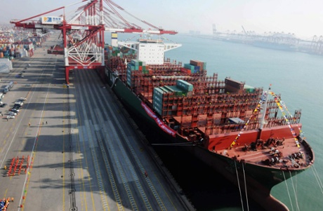 The China Shipping Container Lines Co.Ltd (CSCL) Globe berthing in Qingdao port during its maiden voyage to Europe in Qingdao, east China's Shandong province.