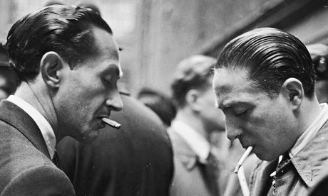 Two spivs count their black market takings in 1945.